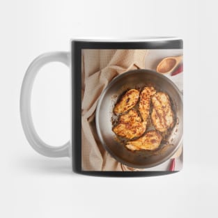 Chicken breast cooking in stainless steel pan Mug